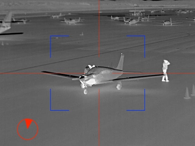 Image from mobile ptz of airport security showing thermal image of people and airplanes
