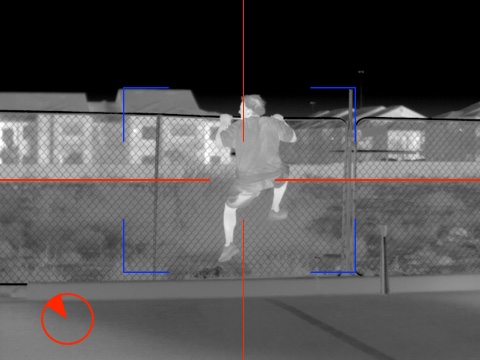 Human climbing fence in thermal image from ptz